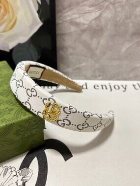 Gucci White GG Monogram Padded Headband with Gold Medallion